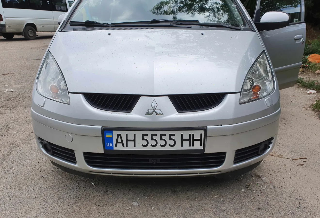 Mitsubishi Colt VI Родной омыватель фар Colt VI | DRIVER.TOP - Українська  спільнота водіїв та автомобілів.