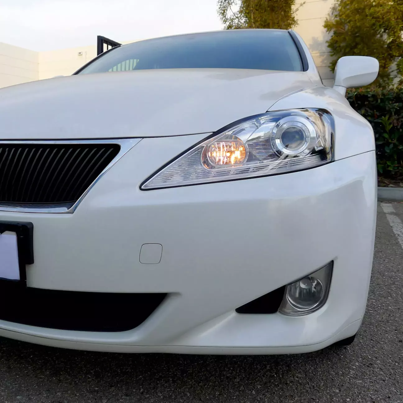 Штатні денні ходові вогні через дальнє світло на Lexus IS XE20 для ринку США