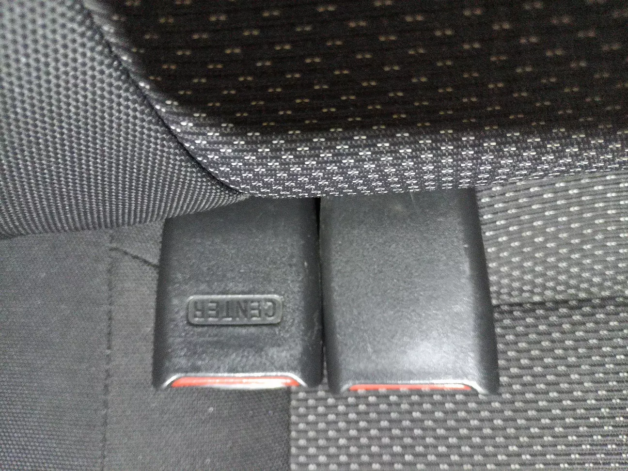 Маркировка замка центрального ремня